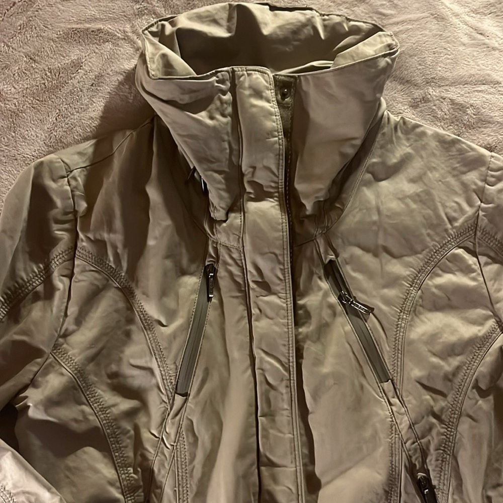 Kuhl jacket. Size S. tailored. 4 pockets. zipper on sleeves.